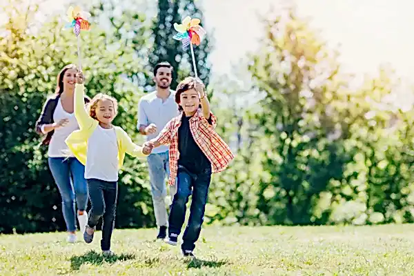 family outside having run in the sun
