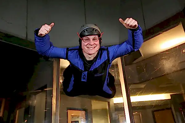 man indoor skydiving