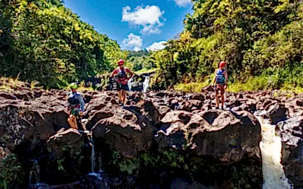people at a waterfall