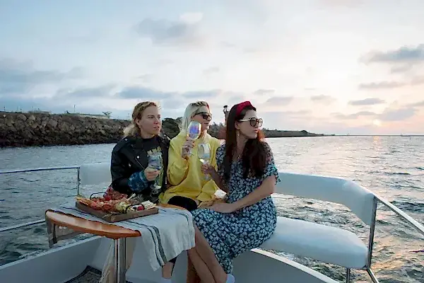 3 women on a boat