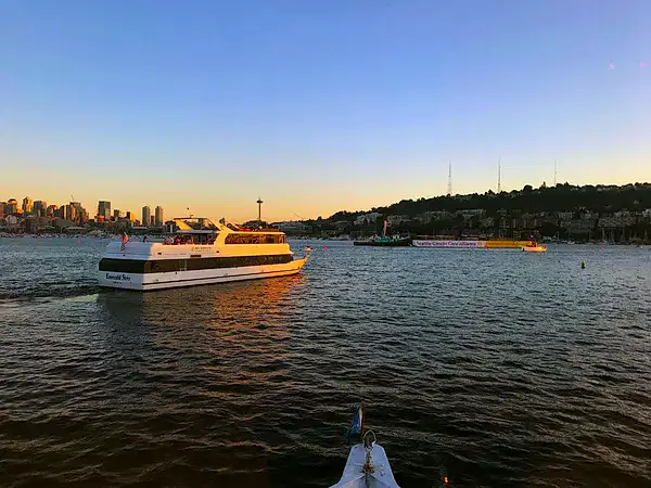 boat sailing at sunset