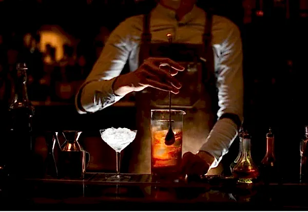 mixologist making drink
