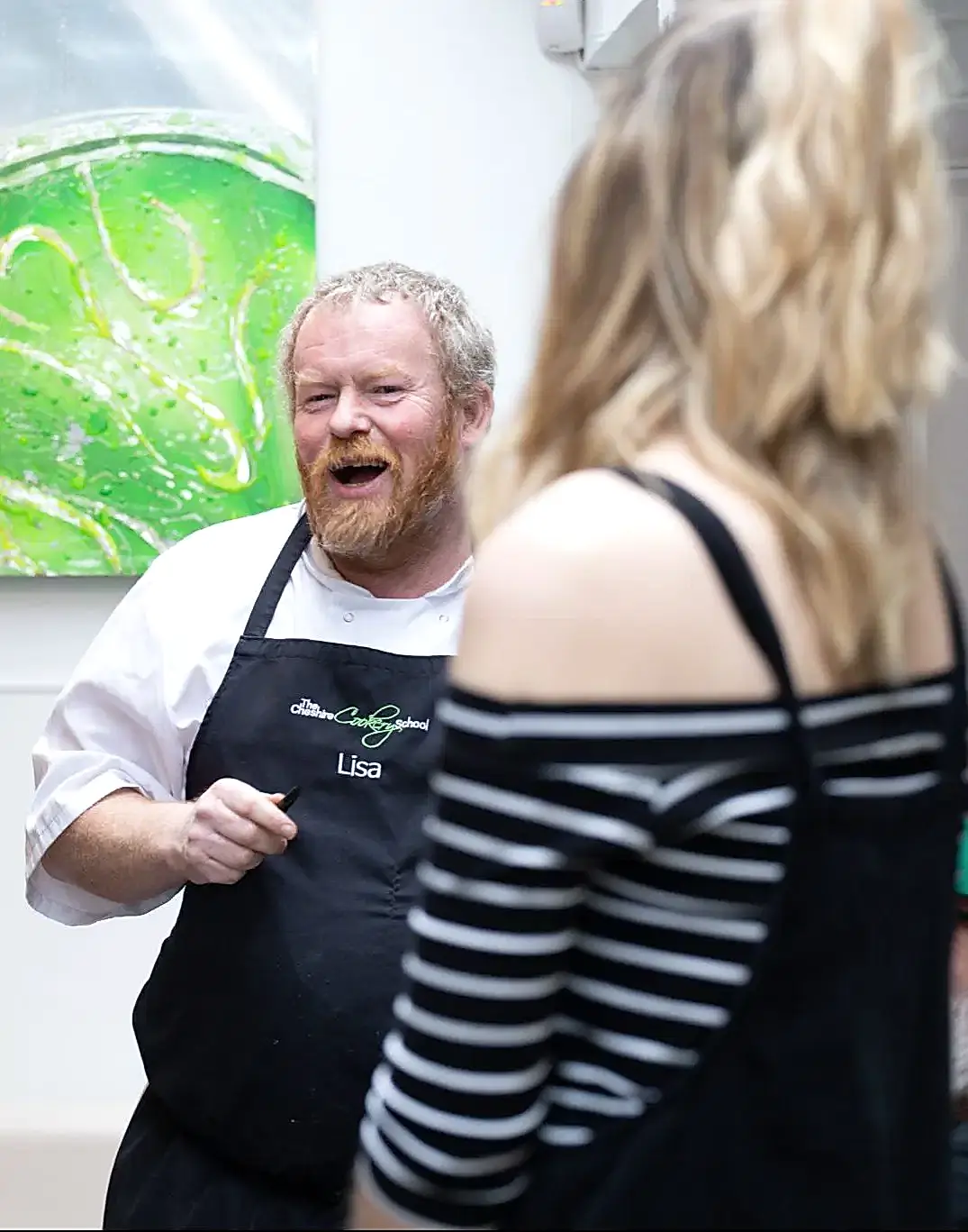 Chef Giving Talk In Meeting Room During Corporate Event