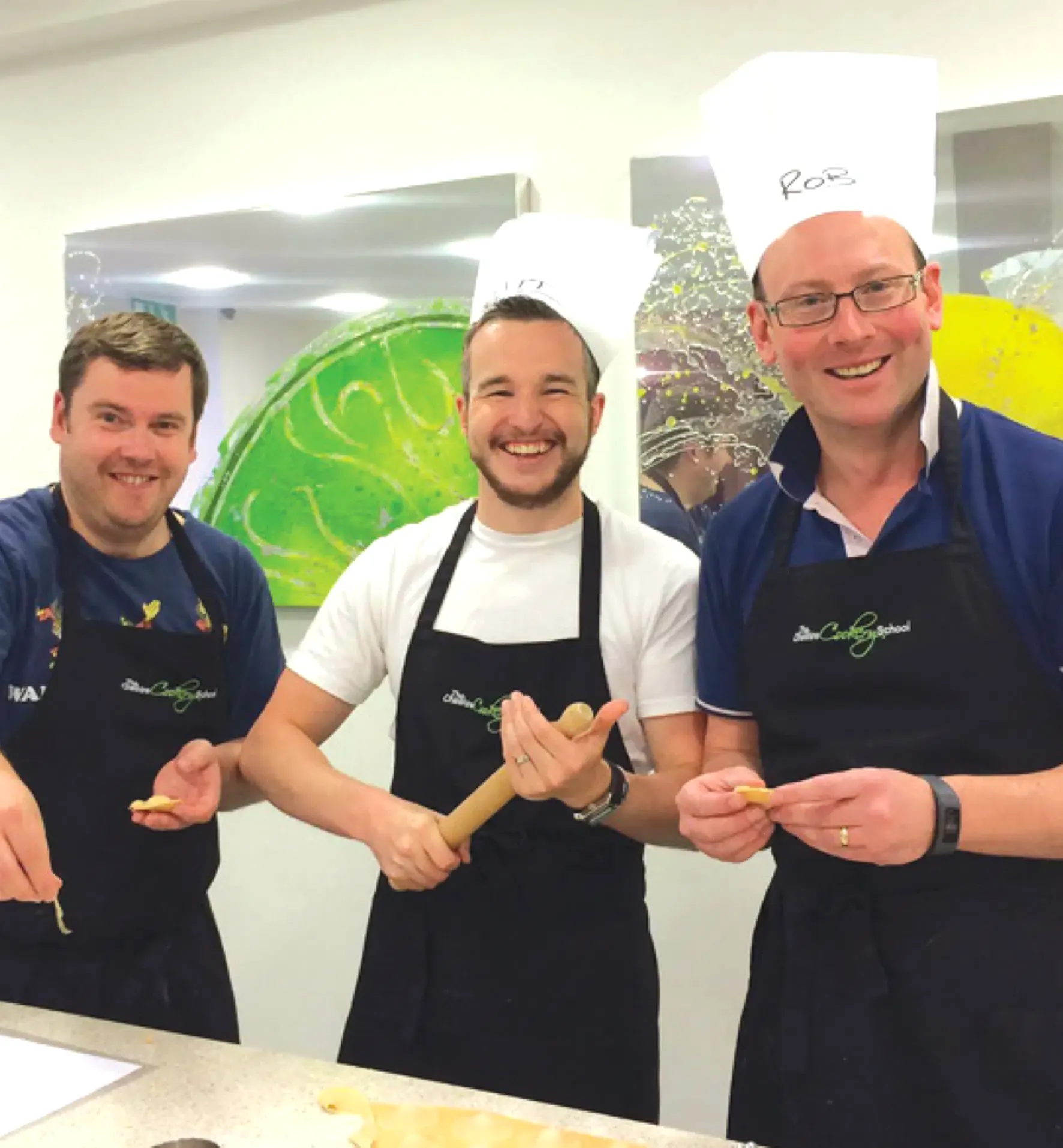 Three People Enjoying Team Building Event 